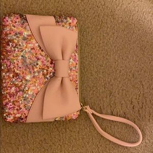 A Betsy Johnson wristlet